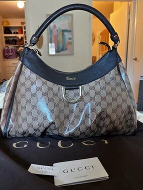 Gucci GG Supreme Brown and Black
Hobo Bag